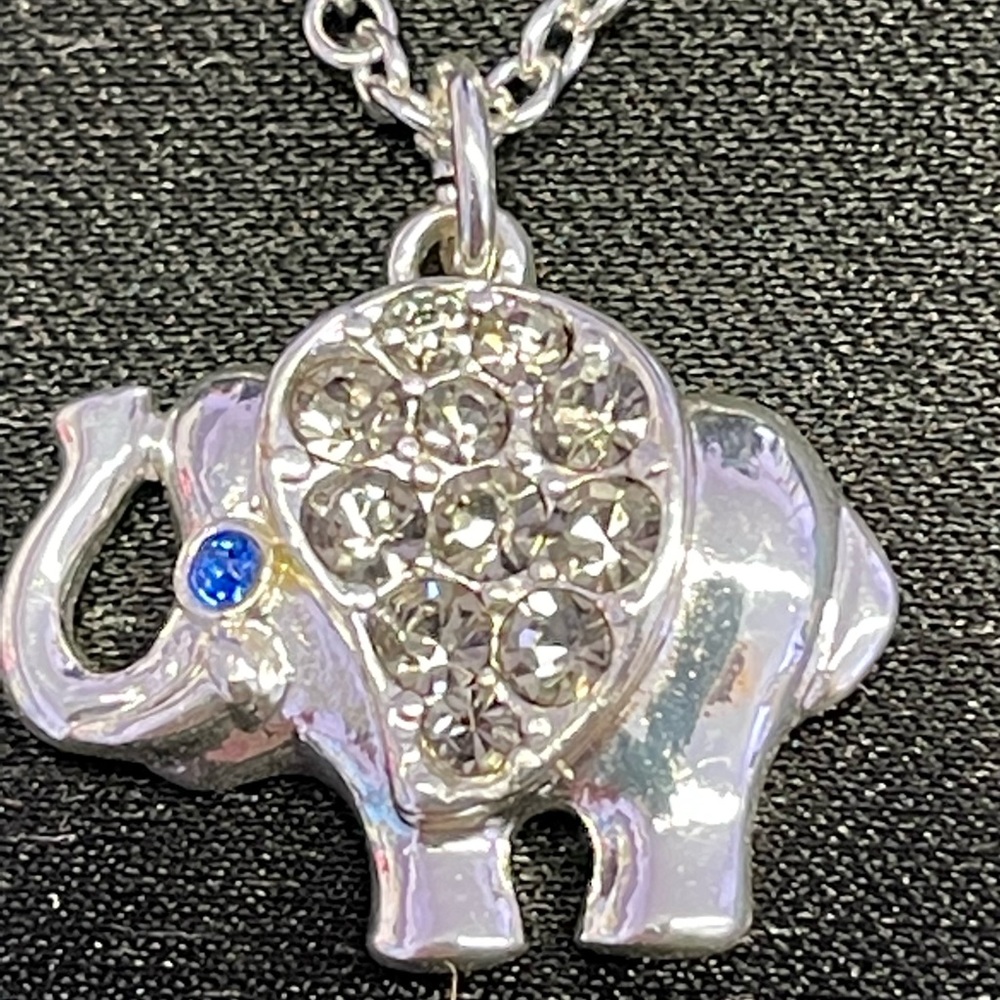 Avon silver tone elephant charm with white stones